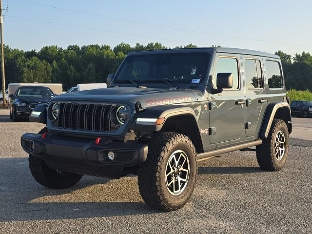 2025 Jeep Wrangler 4-Door Rubicon 4x4 in Gray — front three-quarter view