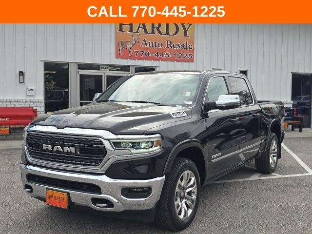 2023 RAM 1500 Limited Crew Cab 4x4 5'7" Box in Black — front three-quarter view
