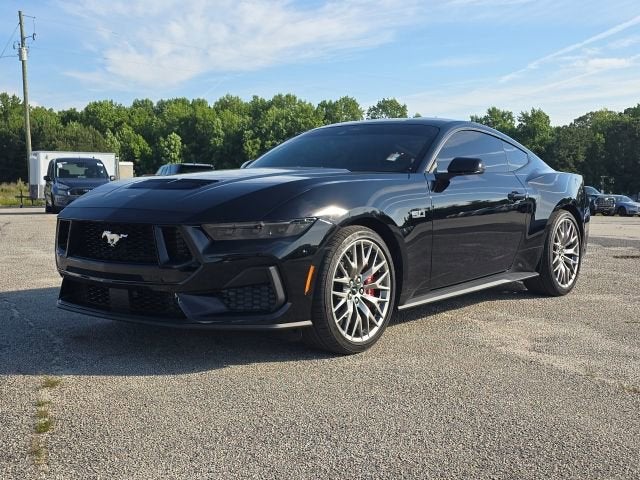 2025 Ford Mustang GT Premium Fastback in Black — front three-quarter view