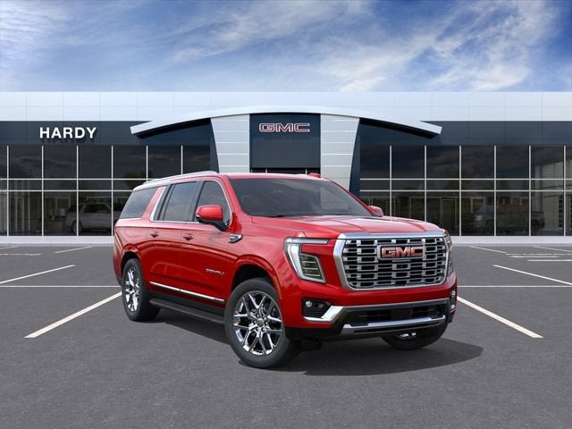 2026 GMC Yukon XL Denali in Volcanic Red Tintcoat — front three-quarter view