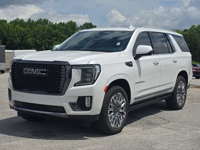 2024 GMC Yukon Denali Ultimate in White Frost Tricoat — front three-quarter view