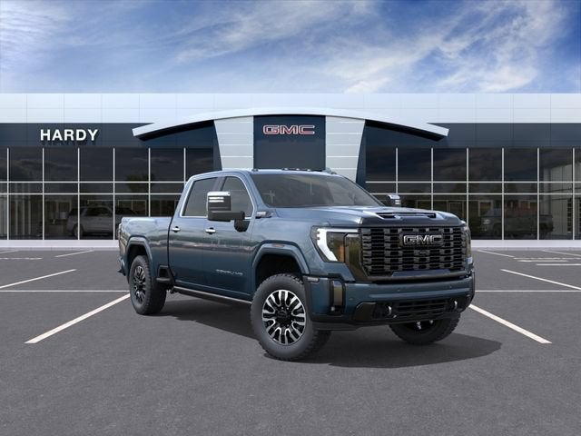 2026 GMC Sierra 2500 HD Denali Ultimate in Downpour Metallic — front three-quarter view