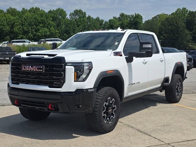 2026 GMC Sierra 2500 HD AT4X in Summit White — front three-quarter view