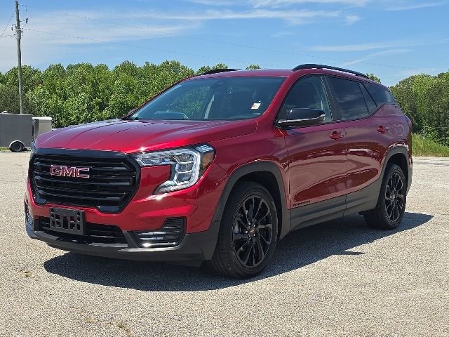 2024 GMC Terrain SLE in Volcanic Red Tintcoat — front three-quarter view