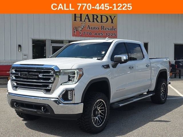 2021 GMC Sierra 1500 SLT in Summit White — front three-quarter view