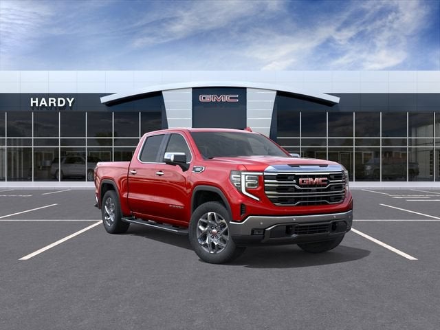 2026 GMC Sierra 1500 SLT in Volcanic Red Tintcoat — front three-quarter view