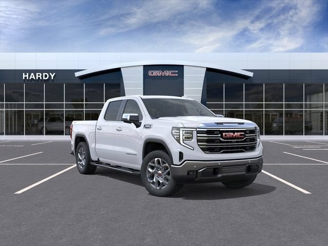 2026 GMC Sierra 1500 SLT in Summit White — front three-quarter view