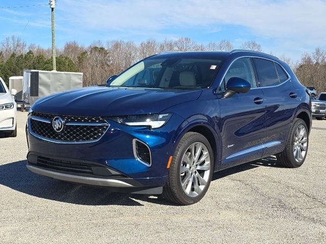 2023 Buick Envision Avenir in Sapphire Metallic — front three-quarter view
